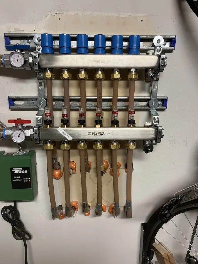 Plumber performing Water Heater Repair at a residential property in Snyder